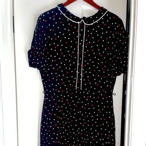 Knee length, very light A-line dress. Black with polkadots. Size 12, medium